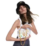chaîne Vanity x TM Pochettes et micro sacs