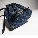 Mini sac seau avec plaque Gucci