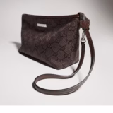 Pochette petit format avec dragonne et plaque Gucci
