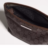 Pochette petit format avec dragonne et plaque Gucci
